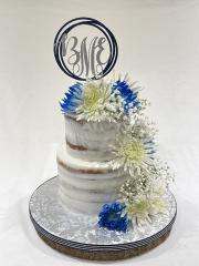 Blue, White And Silver Colors ! Dallas Cowboys Theme Wedding Cake #dallascowboys #footballfans #weddingcakes #seminakedcake #customtoppers #rusticcake 01