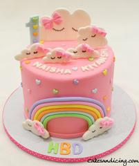 Clouds And Rainbow Theme Cake #clouds #cloudscake #rainbowcake #firstbirthday #girlbirthdaycake #hearts #bows #strawberrycake