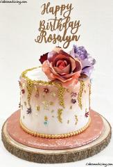 Elegant, Chic , Classy And Beautiful Birthday Cake ! #birthdaycakesforgirls #fondantcake #champagnegoldlustredust #goldsequence #silkflowers #elegantcakes 01