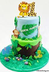 Jungle Theme Cake #happybirthday #happybirthdaycake #jungletheme #junglethemeparty #wildlife #fondantliontopper 01