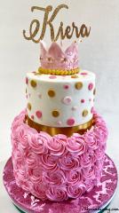 Pinkalicilous Cake For A Princess #firstbirthdaycake #girlbirthdaycake #fondantcrown #pinkrosettecakes #pinkwhiteandgoldpolkadots #fondantpolkadots #strawberrycake #chocolatecake