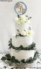 Simple ,elegant And Absolutely Gorgeous Wedding Cake 3 Tier Of Beauty ! #wedding #weddingcake #weddingcakes #texturedbuttercream #freshflowers #freshgreens #chic #goldandcarolina