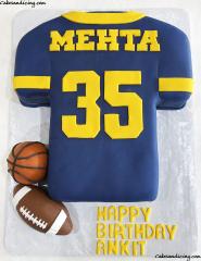 University Of Michigan, Jersey Cake With Fondant Handmade Football And Basketball #michigan #michigancakes #goblue #universityofmichigan #sportscake #gomichigan #michiganfootball