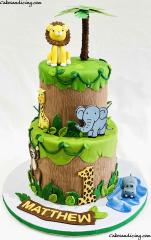 Welcome To The Jungle. First Birthday Cake #junglecake #jungletheme #junglethemecake #safariparty #safarianimals #fondantdecoration #3dlion #giraffe #lion #elephant #monkey 02